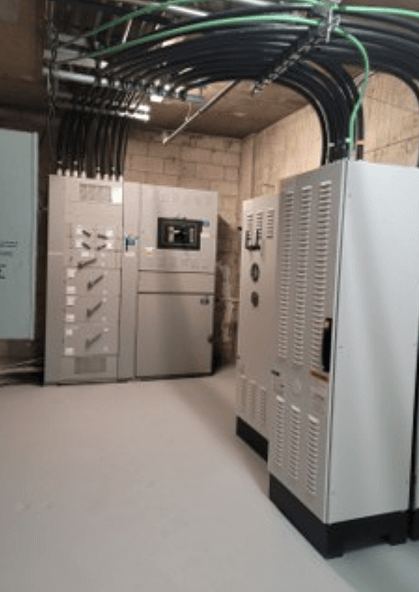 SmartGATE standing beside the building's existing switchgear