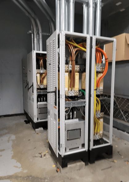 The two-cabinet SmartGATE configuration with cabinet doors open during installation