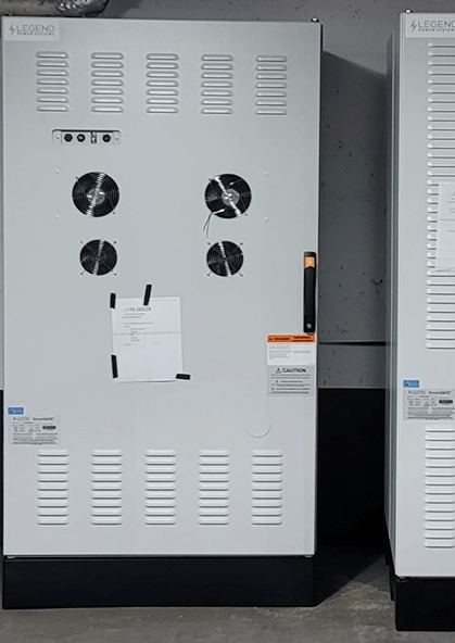 Two SmartGATE cabinets in place in a commercial electrical room, doors closed